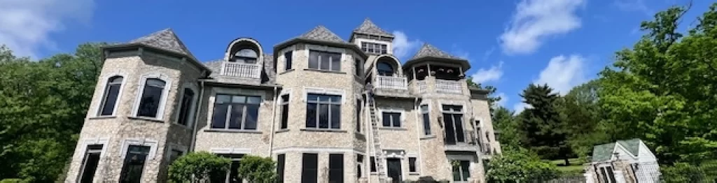 Large Home With Shingle Roof