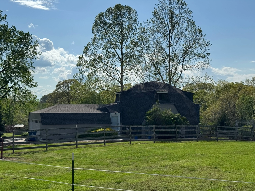 Geodedesic Dome House With Asphalt shingle Roof